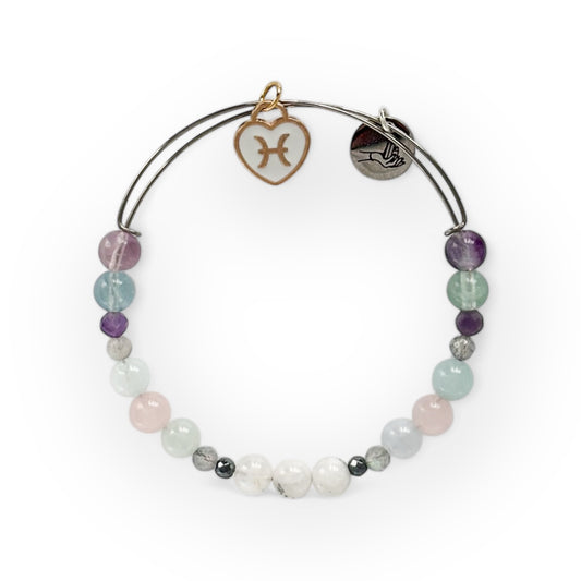 Pisces Crystal Charm Bracelet with a white charm, handcrafted with Moonstone, Hematite, Labradorite, Aquamarine, Rose Quartz, Amethyst, and Fluorite for intuition and emotional balance.