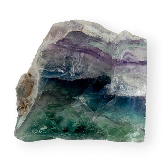 Rainbow Fluorite freeform with polished front face displaying purple, green, and blue banding and natural crystal formations.