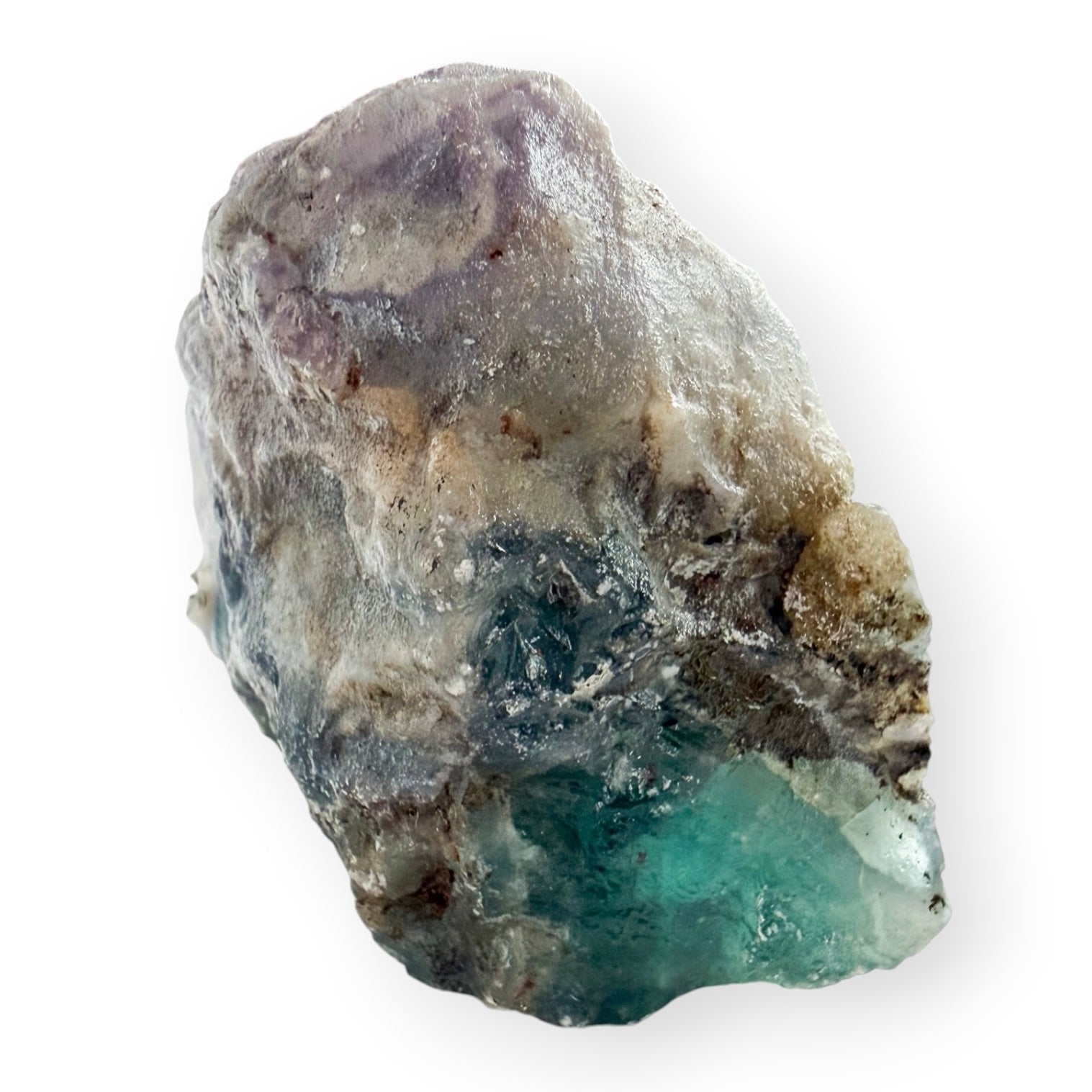 Natural rough back of a Rainbow Fluorite specimen showing raw crystal texture and mineral matrix.