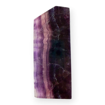 Purple and blue Rainbow Fluorite slab with striking layered bands displayed upright.