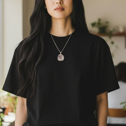 AI model wearing a round drusy silver plated pendant necklace on an 18.5 inch stainless steel chain