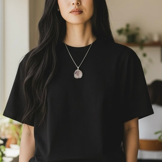 AI model wearing a round drusy silver plated pendant necklace on an 18.5 inch stainless steel chain