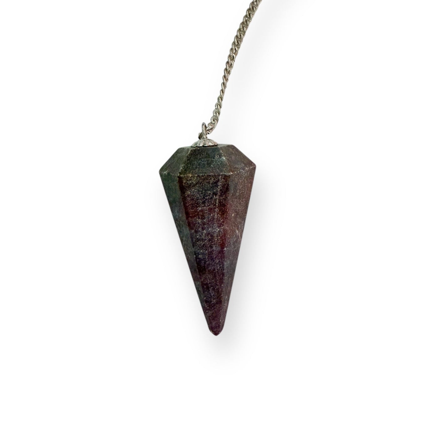Ruby in Kyanite crystal pendulum used for intuition and clarity, held gently on a silver chain