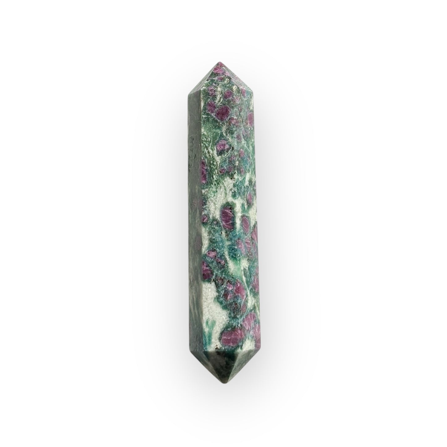Double terminated Ruby in Zoisite wand standing upright with deep ruby inclusions.