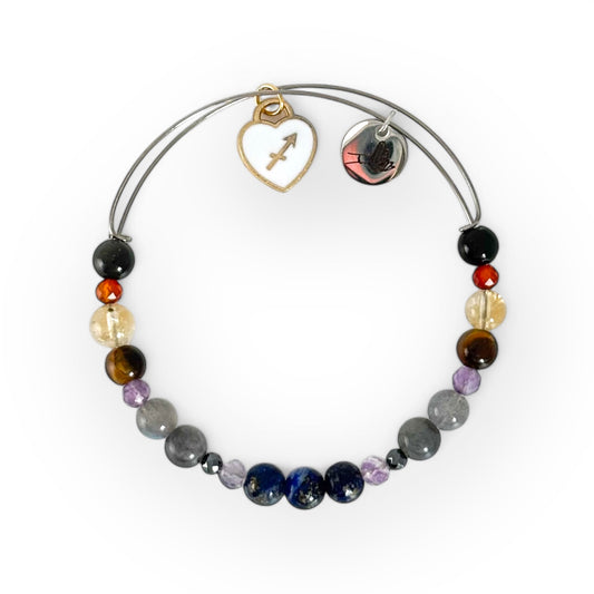Sagittarius Crystal Charm Bracelet with a white charm, handcrafted with Lapis Lazuli, Carnelian, Citrine, and more for adventure, confidence, and wisdom.