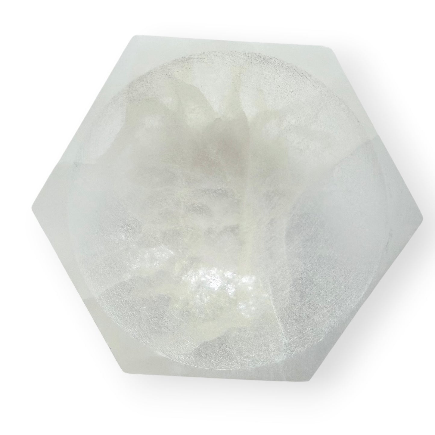White Satin Spar hexagonal bowl with a carved polished interior and natural silky luster.