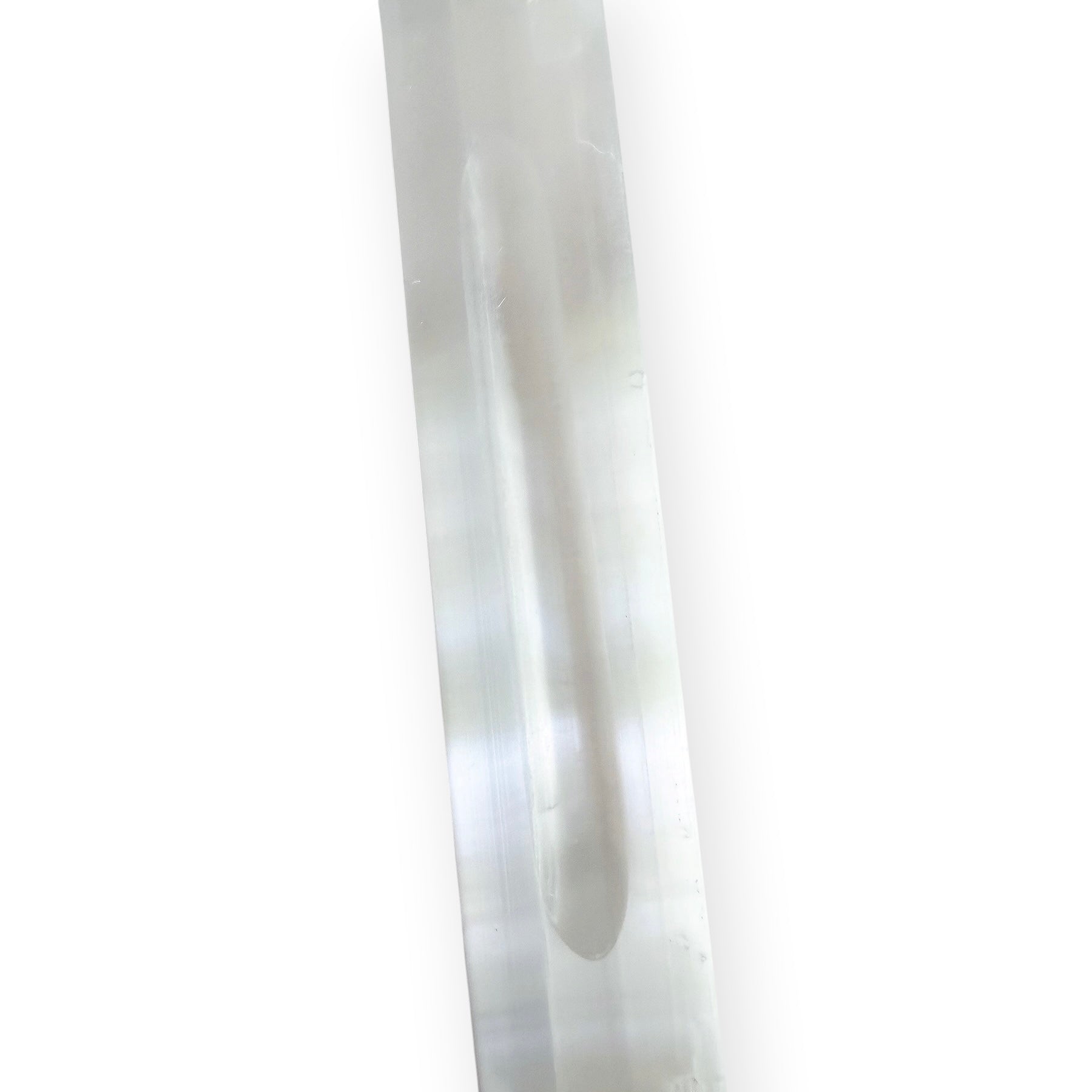Satin spar selenite crystal charging bar with carved center groove and luminous white finish.