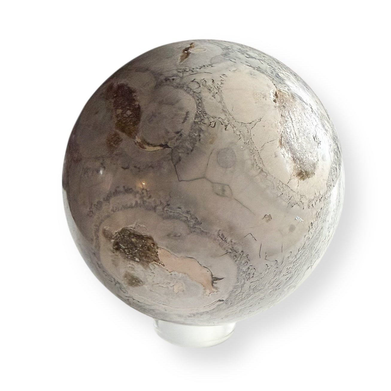 Sea Grass Agate sphere side profile with soft beige, gray, and sand-colored swirls