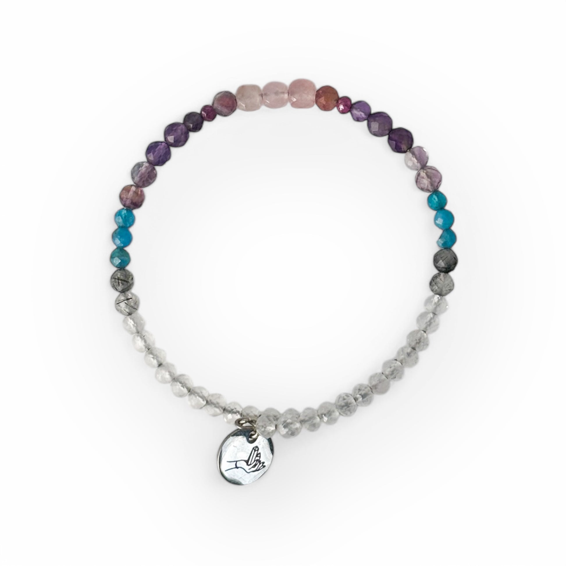 Serenity Crystal Wrap Bracelet worn on wrist with soft pink, purple, and clear beads