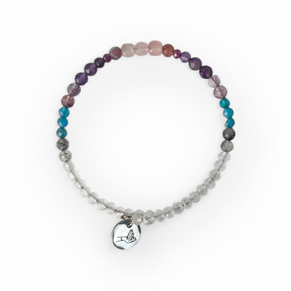 Serenity Crystal Wrap Bracelet worn on wrist with soft pink, purple, and clear beads