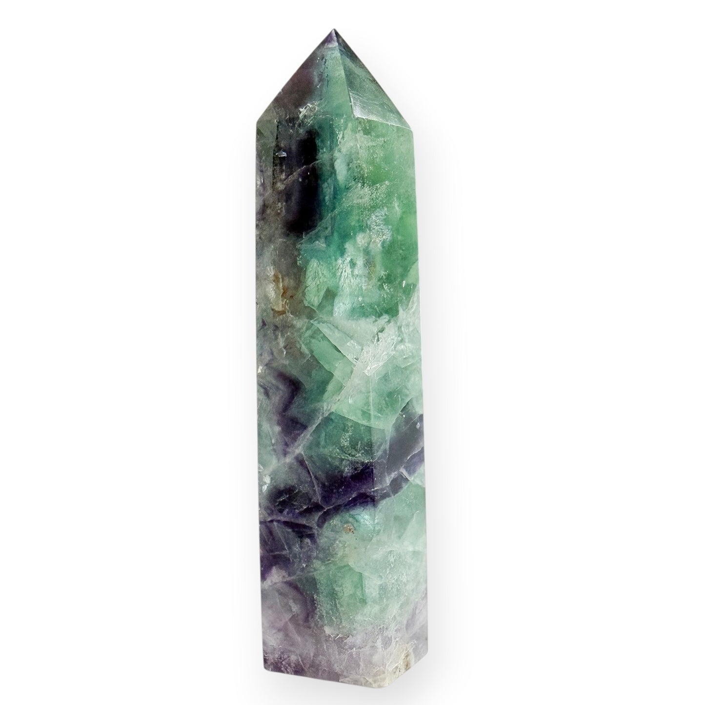 Small polished green and purple Fluorite obelisk with rainbow flashes