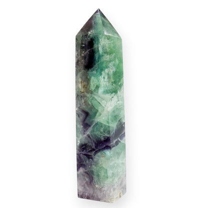 Small polished green and purple Fluorite obelisk with rainbow flashes
