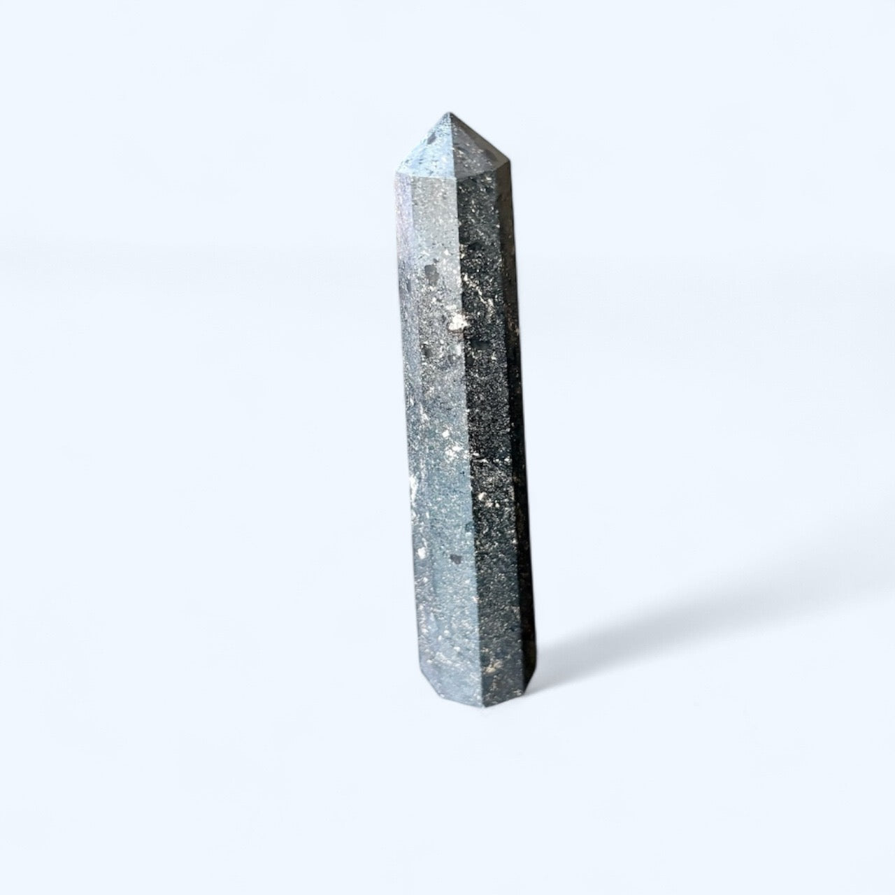 Small Pyrite Obelisk displayed on a desk for confidence and focus