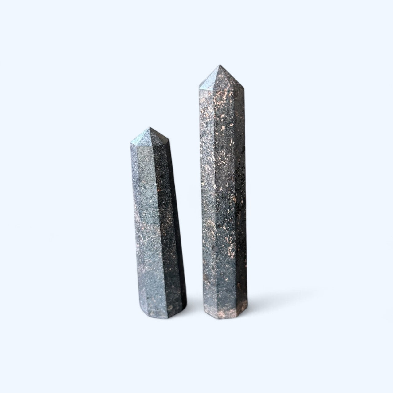 Small Pyrite Obelisk standing upright on white background – front view