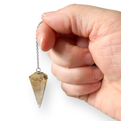 Natural smoky quartz dowsing pendulum used as a metaphysical and spiritual tool