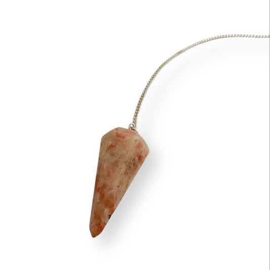 Polished Sunstone pendulum with soft copper and cream coloring on a silver chain against a white background