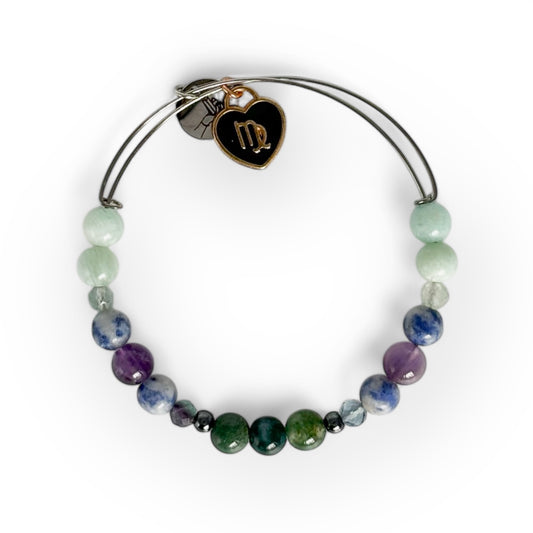 Virgo Crystal Charm Bracelet with a black charm, featuring Moss Agate, Hematite, Fluorite, Sodalite, Amethyst, and Amazonite for mental clarity and balance.